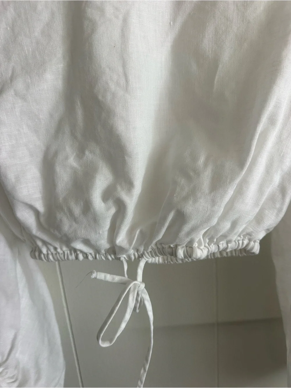 DISSH White Long Sleeve Drawstring Cropped Blouse